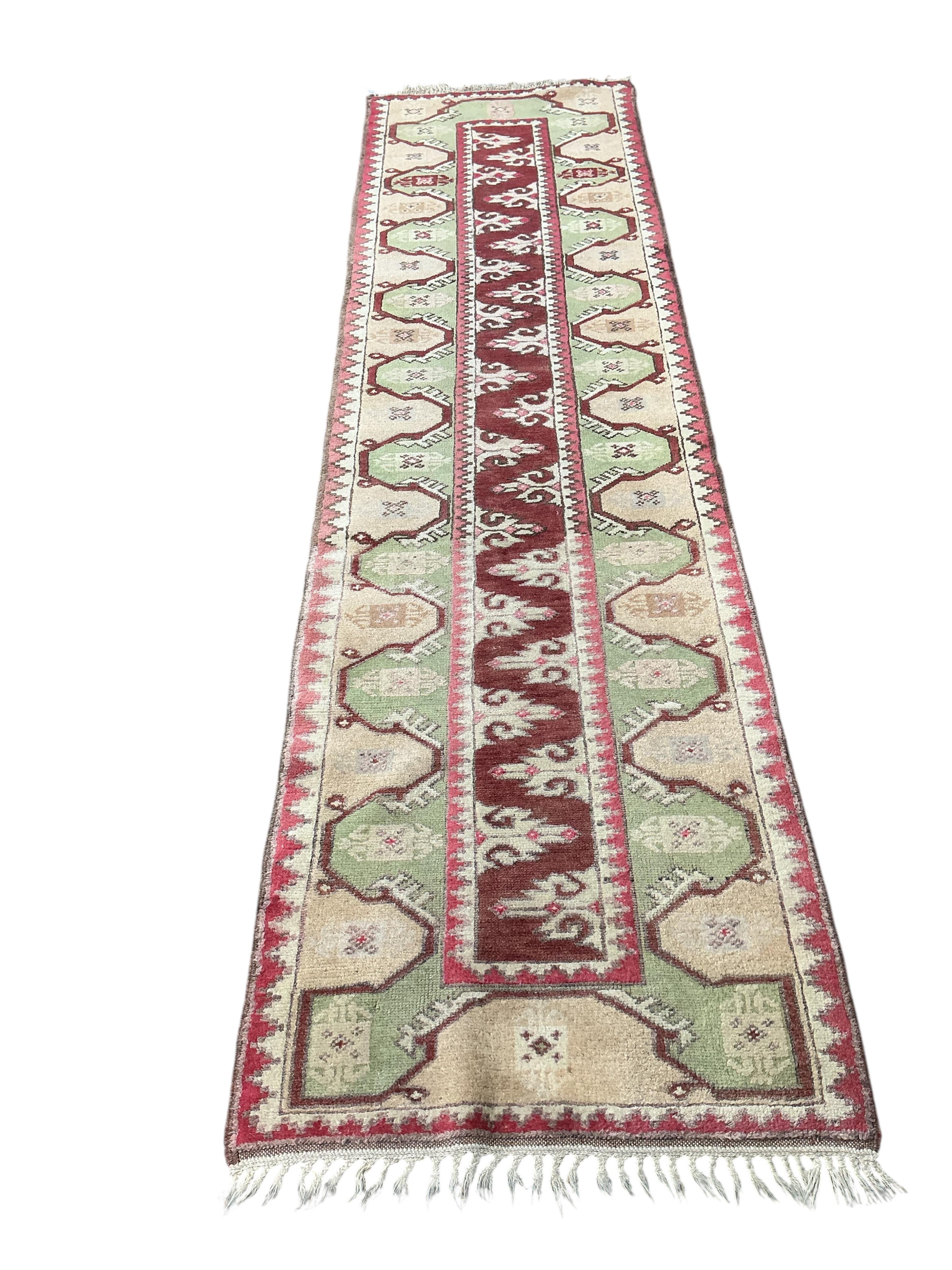 A Turkish polychrome runner, 270 x 72cm